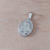 DIJE DE ACERO MEDALLA OVAL DE VIRGEN DE GUADALUPE REVERSIBLE. TAMAÑO 15 X 20 MM