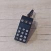 DIJE DE ACERO NEGRO SILBATO CON STRASS. TAMAÑO 13 X 30 MM