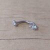 PIERCING DE ACERO PARA OMBLIGO DOBLE CUBIK CORAZÓN BLANCO