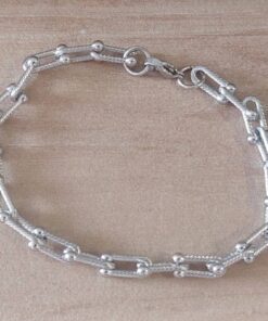 PULSERA DE ACERO ESTILO TIFFANY TRABAJADO CON RAYAS. LARGO 21,5 CM