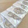 BLISTER DE ARGOLLAS ACERO TRABAJADAS X 12 PARES. DIÁMETROS 12/18/23 MM (4 PARES DE CADA MEDIDA)