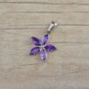 DIJE DE ACERO FLOR STRASS LILA . MEDIDA 18 MM