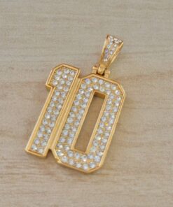 DIJE DE ACERO DORADO NUMERO 10 CON STRASS. TAMAÑO 29 X 52 MM