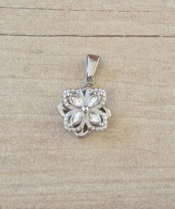 DIJE DE ACERO FLOR GIRATORIA CON CUBIK Y STRASS . MEDIDA 15 MM