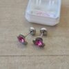 ABRIDOR DE ACERO FLOR CON STRASS ROSA