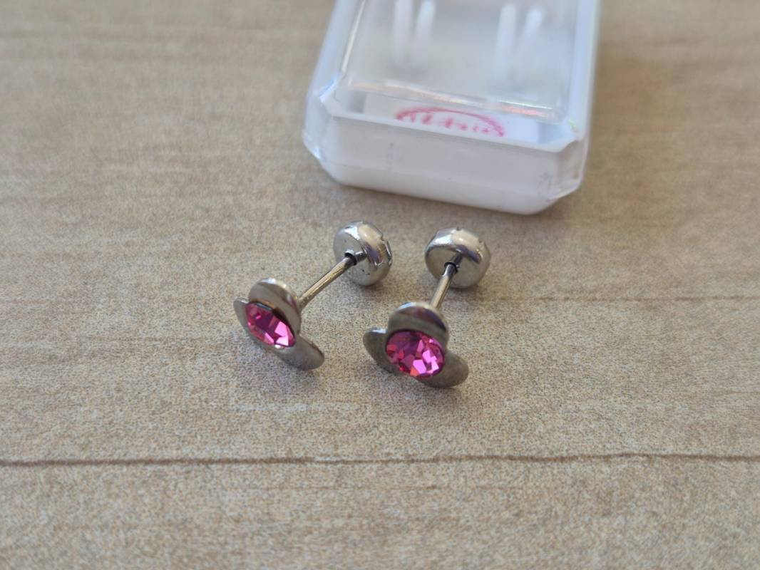 ABRIDOR DE ACERO FLOR CON STRASS ROSA