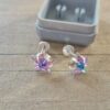 ABRIDOR PLATA CUBIK ESTRELLA 7 MM COLOR TORNASOL