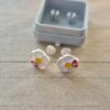 ABRIDOR PLATA ESMALTADO MARGARITA CON VAQUITA