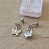 ABRIDOR DE ACERO CON MARIPOSA COLGANTE