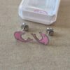 ABRIDOR DE ACERO DELFIN ESMALTADO EN ROSA