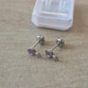 ABRIDOR DE ACERO CON STRASS LILA