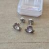 ABRIDOR DE ACERO FLOR CON STRASS BLANCO