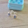 ABRIDOR PLATA CIRCULO CON CORAZON CON STRASS CELESTE