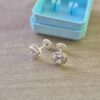 ABRIDOR PLATA CIRCULO CON CORAZON CON STRASS BLANCO