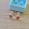 ABRIDOR PLATA CIRCULO CON CORAZON CON STRASS ROJO