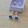ABRIDOR PLATA CUBIK REDONDO ENGARZADO CELESTE 7 MM