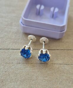 ABRIDOR PLATA CUBIK REDONDO ENGARZADO CELESTE 7 MM