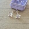 ABRIDOR PLATA CUBIK REDONDO ENGARZADO CUATRO PUNTAS GRANDE COLOR BLANCO