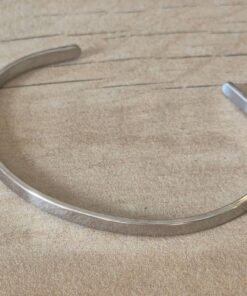 PULSERA DE ACERO ESCLAVA LISA ABIERTA. ANCHO 6 MM
