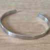 PULSERA DE ACERO ESCLAVA LISA ABIERTA. ANCHO 8 MM