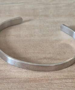 PULSERA DE ACERO ESCLAVA LISA ABIERTA. ANCHO 8 MM
