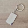 LLAVERO DE ACERO CON DIJE RECTANGULAR PARA GRABAR 25 X 42 MM (1 MM ESPESOR) PULIDO UNA CARA. LARGO TOTAL 100 MM