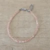 PULSERA DE TANZA CON MOSTACILLAS ROSA DIOR Y TERMINAL DE ACERO.  LARGO 18 + 3.5 CM  EXT.