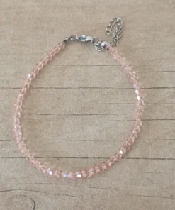 PULSERA DE TANZA CON MOSTACILLAS ROSA DIOR Y TERMINAL DE ACERO.  LARGO 18 + 3.5 CM  EXT.