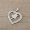 DIJE DE ACERO CORAZON CON STRASS Y CORAZÓN FLECHADO. TAMAÑO 30 MM .