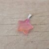 DIJE DE ACERO PIEDRA DEGRADE DE NARANJA A ROSA EN FORMA DE ESTRELLA. 20 MM