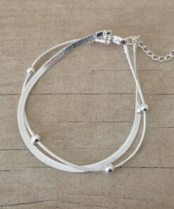 PULSERA DE ACERO BLANCO VÍBORA CHATA COMBINADA CON CLAPTON CON BOLITA. LARGO 19 CM + EXT. 4,5 CM.