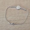 PULSERA DE ACERO COLA DE RATON CON BOLITAS Y DIJE SAN BENITO. LARGO 18,5 CM
