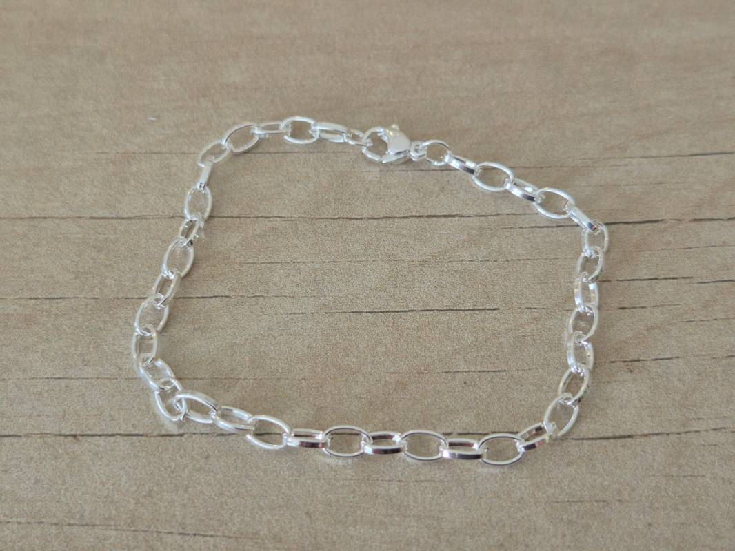 PULSERA DE ACERO BLANCO ESLABÓN OVAL . LARGO 18,5 CM.