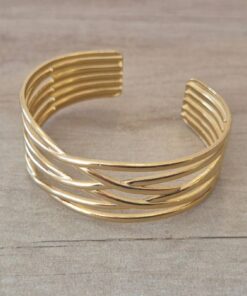 PULSERA DE ACERO DORADO ESCLAVA ABIERTA TRABAJADA