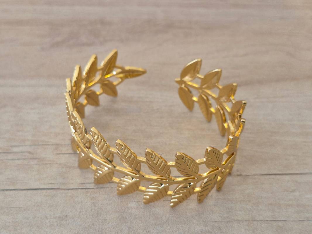 PULSERA DE ACERO DORADO ESCLAVA ABIERTA TRABAJADA