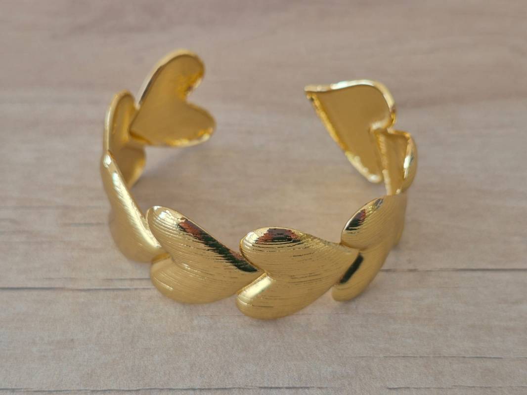 PULSERA DE ACERO DORADO ESCLAVA ABIERTA TRABAJADA