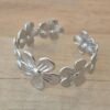 PULSERA DE ACERO ESCLAVA ABIERTA TRABAJADA