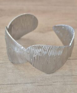 PULSERA DE ACERO ESCLAVA ABIERTA TRABAJADA