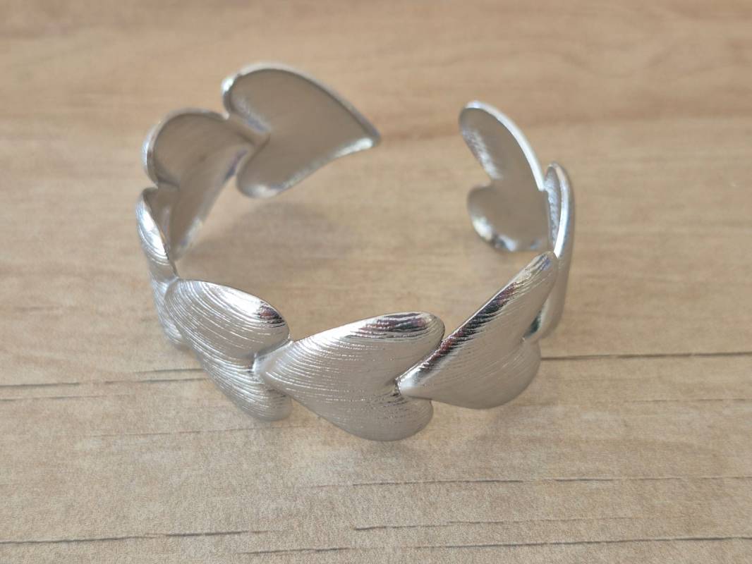 PULSERA DE ACERO ESCLAVA ABIERTA TRABAJADA