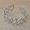 PULSERA DE ACERO ESCLAVA ABIERTA TRABAJADA