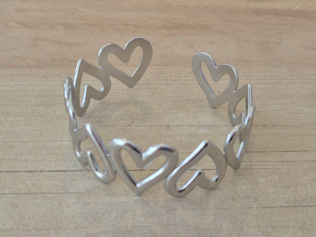 PULSERA DE ACERO ESCLAVA ABIERTA TRABAJADA