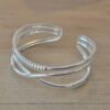 PULSERA DE ACERO BLANCO ESCLAVA ABIERTA