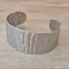 PULSERA DE ACERO ESCLAVA ABIERTA TRABAJADA