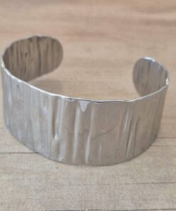 PULSERA DE ACERO ESCLAVA ABIERTA TRABAJADA