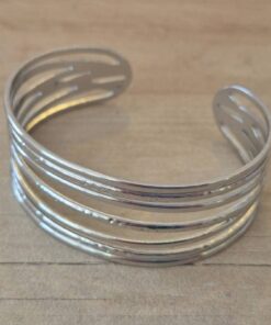 PULSERA DE ACERO ESCLAVA ABIERTA TRABAJADA
