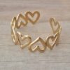 PULSERA DE ACERO DORADO ESCLAVA ABIERTA TRABAJADA