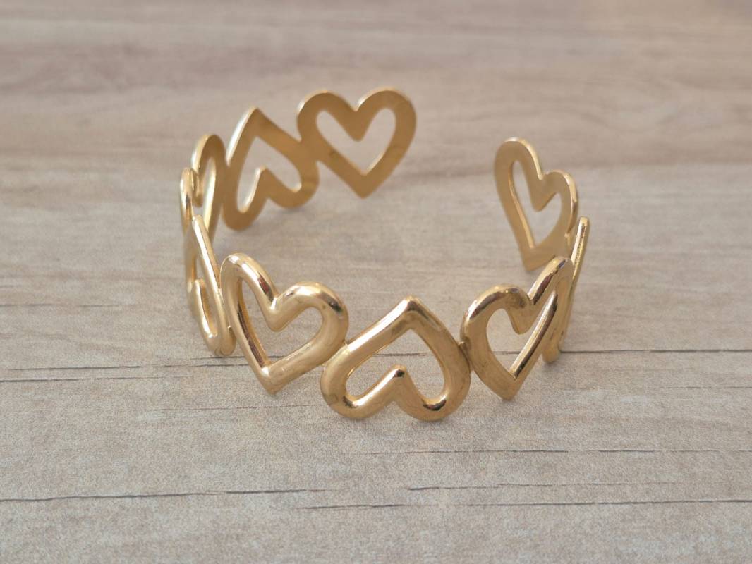 PULSERA DE ACERO DORADO ESCLAVA ABIERTA TRABAJADA
