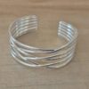 PULSERA DE ACERO BLANCO ESCLAVA ABIERTA