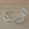 PULSERA DE ACERO BLANCO ESCLAVA ABIERTA
