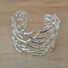 PULSERA DE ACERO BLANCO ESCLAVA ABIERTA